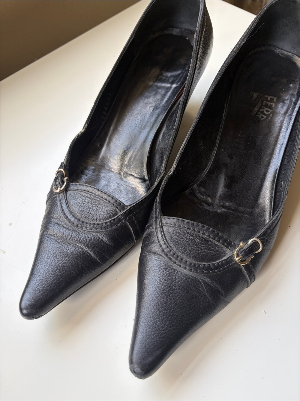 Salvatore Ferragamo Black Pointed Toe Leather Pumps with Buckle Accent